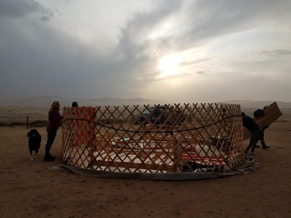 Nomadic family migrating with camels to new pasture